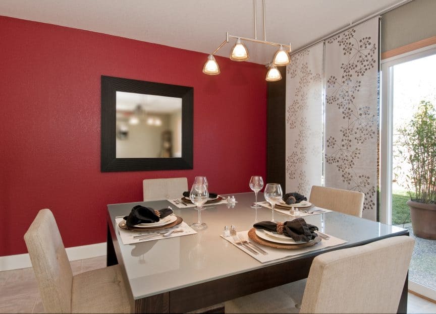 Red Dining Room with Warm Lighting